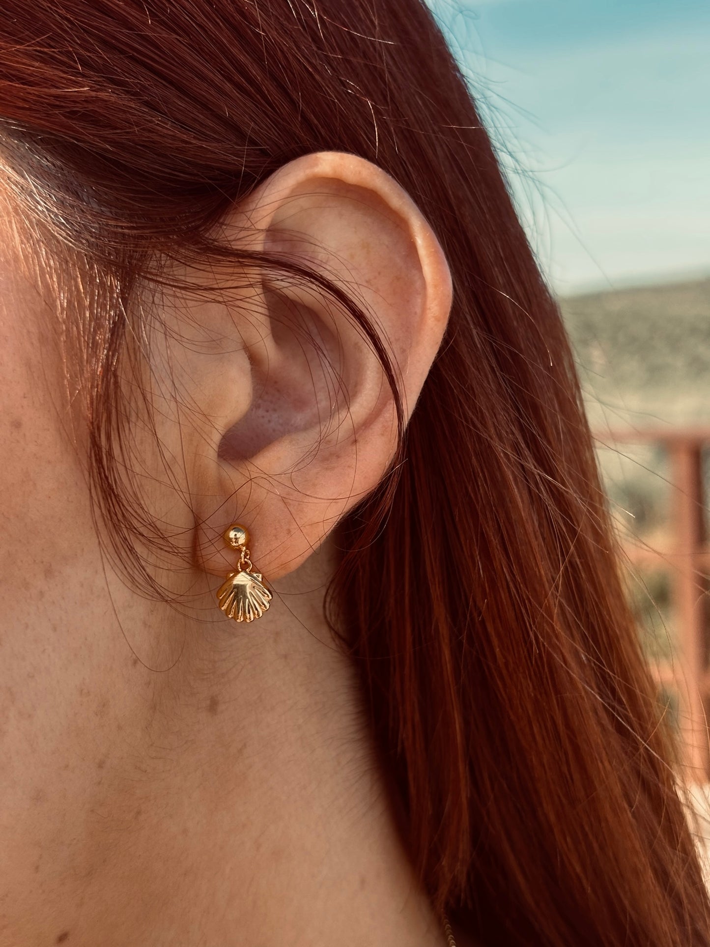 Pendientes Mar mostrados en oreja de mujer 